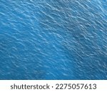 Blue ocean water texture background. Surface of the sea.