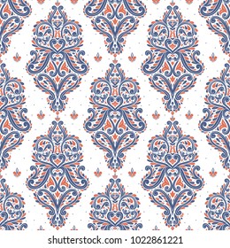 Blue and orange ornamental seamless pattern. Vintage, paisley elements. Ornament. Traditional, Ethnic, Turkish, Indian motifs. Great for fabric and textile, wallpaper, packaging or any desired idea