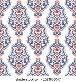 Blue and orange ornamental seamless pattern. Vintage, paisley elements. Ornament. Traditional, Ethnic, Turkish, Indian motifs. Great for fabric and textile, wallpaper, packaging or any desired idea