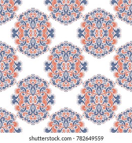 Blue and orange ornamental seamless pattern. Vintage, paisley elements. Ornament. Traditional, Ethnic, Turkish, Indian motifs. Great for fabric and textile, wallpaper, packaging or any desired idea. 