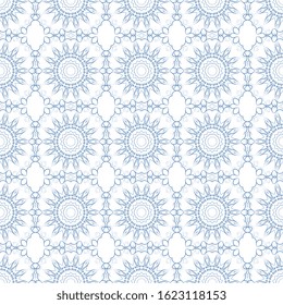 Blue ornament on white background. Seamless floral pattern on background. Wallpaper pattern. Textile pattern