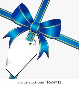 Blue ornamental bow with white empty tag