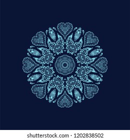 Blue ornamental vector rosette - snowflake on dark background