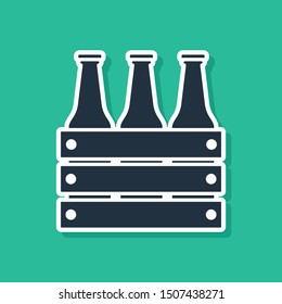 Blue Pack of beer bottles icon isolated on green background. Wooden box and beer bottles. Case crate beer box sign.  Vector Illustration