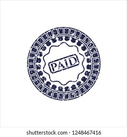 Blue paid icon inside distressed rubber grunge seal