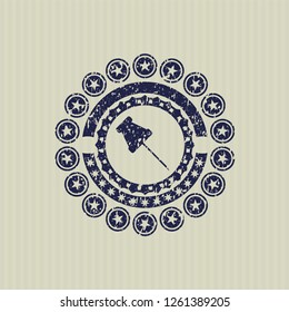 Blue paper pin icon inside distressed rubber stamp with grunge texture