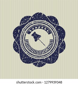 Blue paper pin icon inside grunge seal