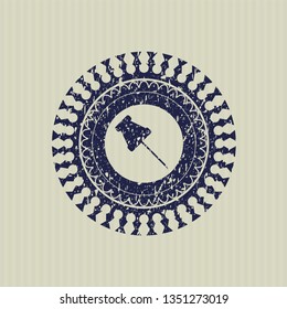 Blue paper pin icon inside distressed grunge seal