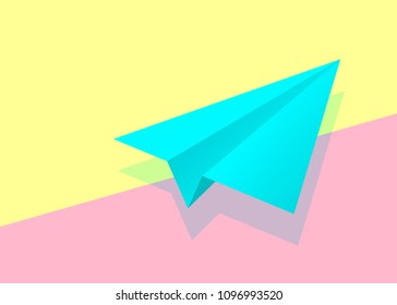 blue paper plane icon with shadow on pink and yellow pastel colored background. fashion flat lay concept