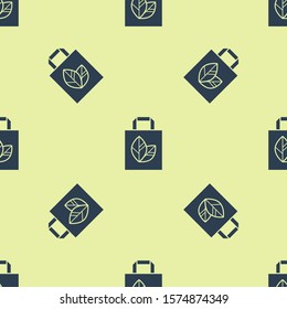Blue Paper shopping bag with recycle icon isolated seamless pattern on yellow background. Bag with recycling symbol.  Vector Illustration