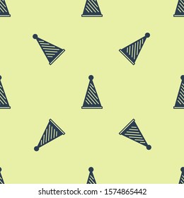 Blue Party hat icon isolated seamless pattern on yellow background. Birthday hat.  Vector Illustration