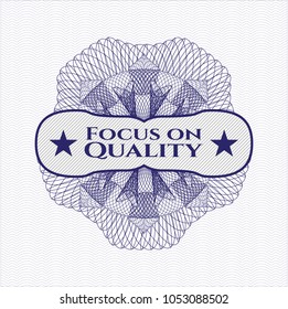 Blue passport money rossete with text Focus on Quality inside
