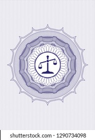 Blue passport money style rosette with scale icon inside