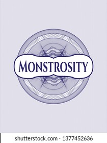 Blue passport money style rosette with text Monstrosity inside