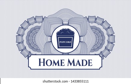 Blue passport money style rosette with popcorn icon and Home Made text inside