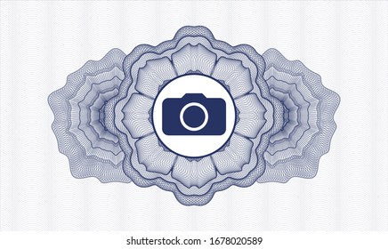 Blue passport rosette with photo camera icon inside