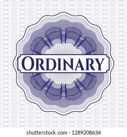 Blue passport style rosette with text Ordinary inside