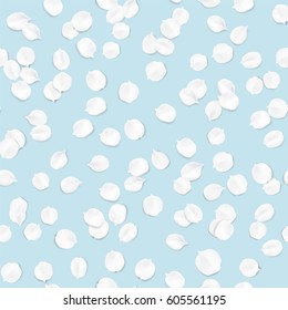 Blue pastel spring macro background. White apple tree flower blossom petals on the table, seamless pattern illustration