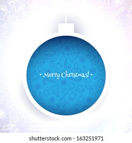 Blue Patterned Christmas ball on light background. Christmas design, good for postcards.