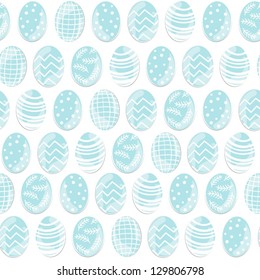 Blue patterned Easter eggs in rows on white background