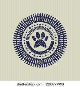 Blue paw icon inside distressed grunge style stamp