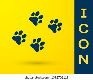 Blue Paw print icon isolated on yellow background. Dog or cat paw print. Animal track. Vector Illustration