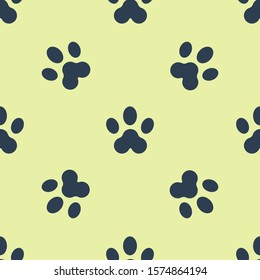 Blue Paw print icon isolated seamless pattern on yellow background. Dog or cat paw print. Animal track.  Vector Illustration