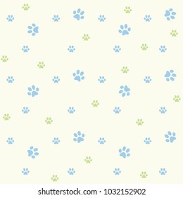 Blue paws with green small paws seamless on yellow background