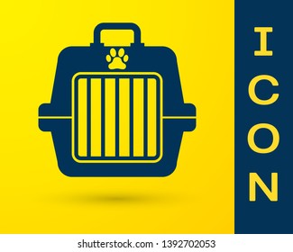 Blue Pet carry case icon isolated on yellow background. Carrier for animals, dog and cat. Container for animals. Animal transport box. Vector Illustration