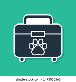 Blue Pet first aid kit icon isolated on green background. Dog or cat paw print. Clinic box.  Vector Illustration