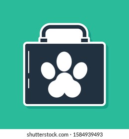 Blue Pet first aid kit icon isolated on green background. Dog or cat paw print. Clinic box.  Vector Illustration