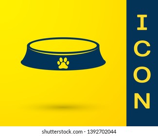 Blue Pet food bowl for cat or dog icon isolated on yellow background. Dog or cat paw print. Vector Illustration