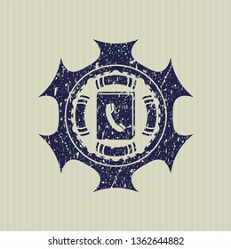 Blue phonebook icon inside distress rubber stamp with grunge texture