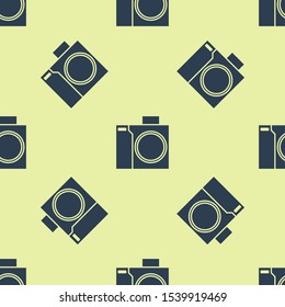 Blue Photo camera for diver icon isolated seamless pattern on yellow background. Foto camera icon. Diving underwater equipment.  Vector Illustration