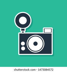 Blue Photo camera icon isolated on green background. Foto camera icon.  Vector Illustration