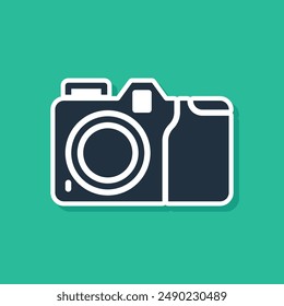 Blue Photo camera icon isolated on green background. Foto camera icon.  Vector