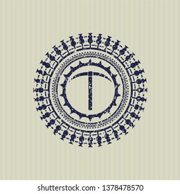 Blue pickaxe icon inside distress rubber grunge texture stamp