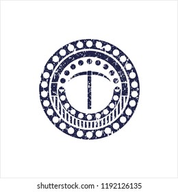 Blue pickaxe icon inside distressed rubber seal