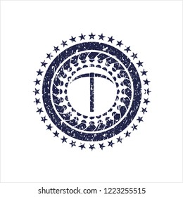 Blue pickaxe icon inside rubber grunge stamp