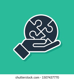 Blue Piece of puzzle in hand icon isolated on green background. Business, marketing, finance, template, layout, infographics concept.  Vector Illustration