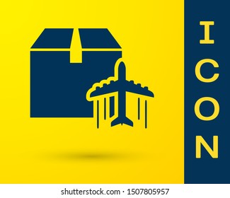 Blue Plane and cardboard box icon isolated on yellow background. Delivery, transportation. Cargo delivery by air. Airplane with parcels, boxes.  Vector Illustration