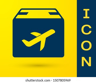 Blue Plane and cardboard box icon isolated on yellow background. Delivery, transportation. Cargo delivery by air. Airplane with parcels, boxes.  Vector Illustration