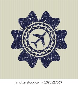 Blue plane icon inside distress rubber seal with grunge texture