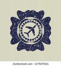 Blue plane icon inside distressed grunge style stamp