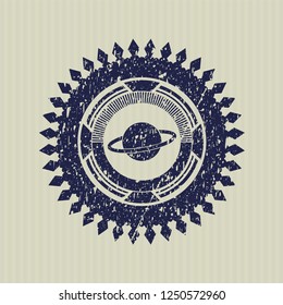 Blue planet, saturn icon inside rubber seal with grunge texture