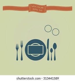 Blue plate with spoon, knife and fork