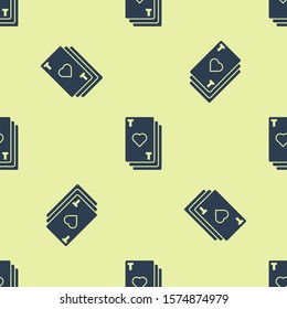 Blue Playing card with heart symbol icon isolated seamless pattern on yellow background. Casino gambling.  Vector Illustration