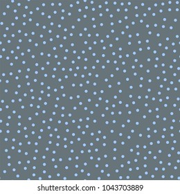 Blue polka dots seamless pattern on grey background.
