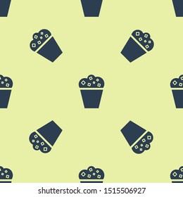 Blue Popcorn in cardboard box icon isolated seamless pattern on yellow background. Popcorn bucket box.  Vector Illustration