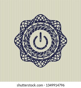 Blue power icon inside distress rubber grunge stamp
